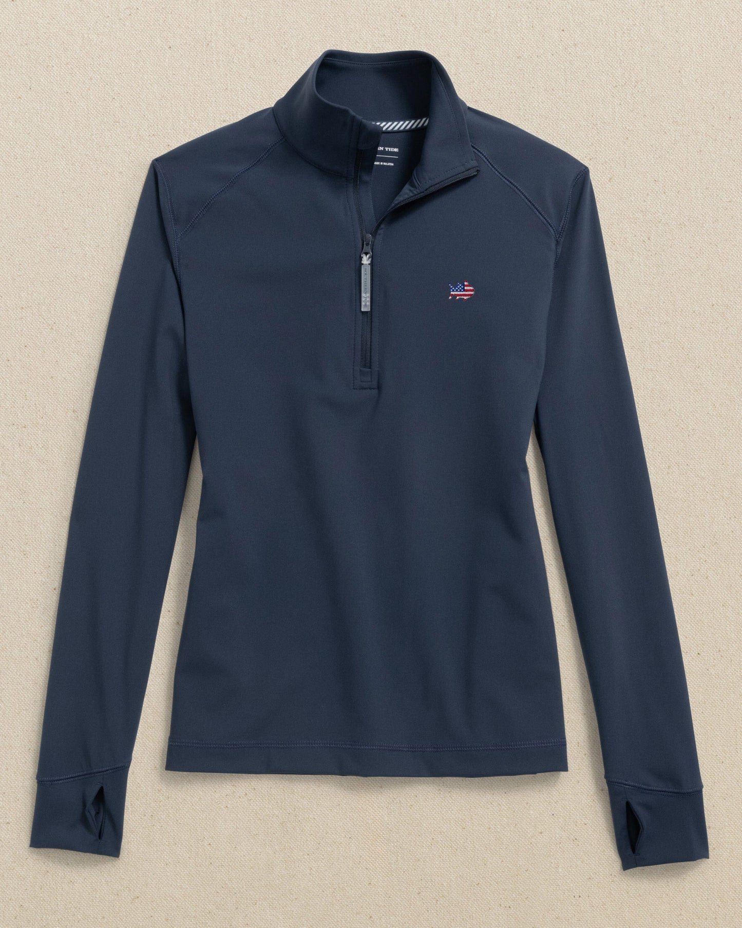 The front view of the Southern Tide USA Flag Skipjack Runaround Quarter Zip by Southern Tide - Dress Blue